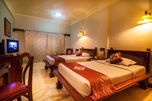 Melasti Kuta Bungalows & Spa Stop at Melasti Kuta Bungalows & Spa to discover the wonders of Bali. The property features a wide range of facilities to make your stay a pleasant experience. Service-minded staff will welcome and gu