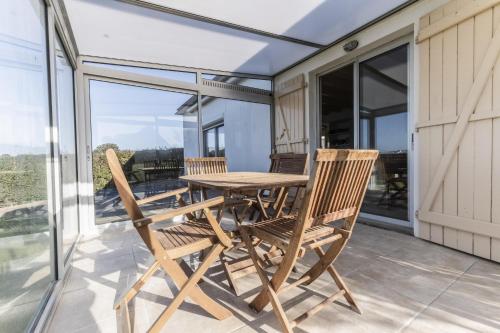 Jolie maison et sa veranda pour de belles vacances