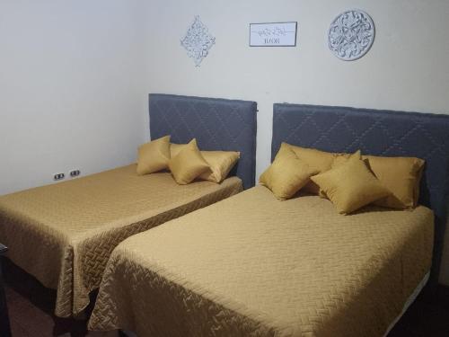 Bed, AZURA HOTEL BOUTIQUE in Coban