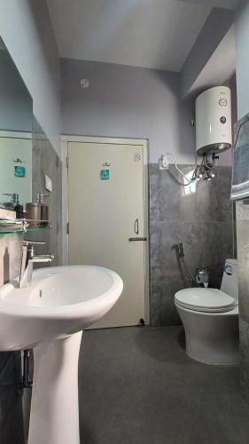 Bathroom, Odyssey Stays Shillong in Malki