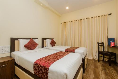 Hotel Divine Residency Near Phoenix Marketcity