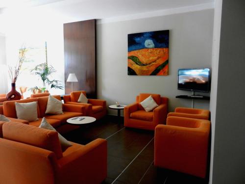 Спільний лаунж/ТБ зона, Hotel Santo Stefano in П'єве-Санто-Стефано