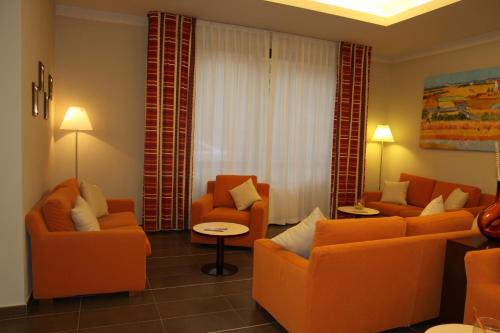 Спільний лаунж/ТБ зона, Hotel Santo Stefano in П'єве-Санто-Стефано