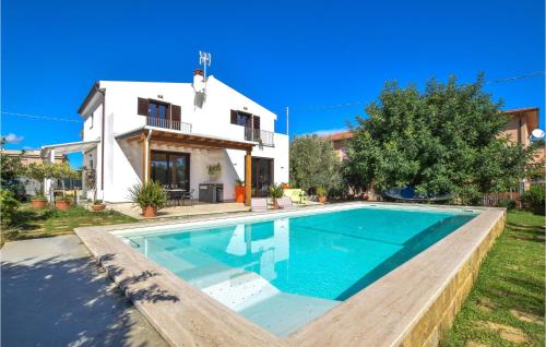 Awesome Home In Trabia With Outdoor Swimming Pool, 3 Bedrooms And Wifi
