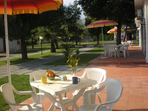 Villaggio Artemide Villaggio Artemide is conveniently located in the popular Porticato area. Both business travelers and tourists can enjoy the propertys facilities and services. Service-minded staff will welcome and g