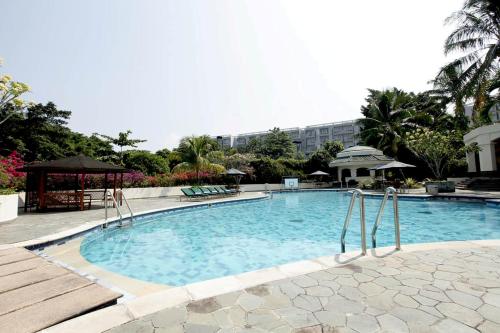 Swimming pool, R Hotel Rancamaya in Bogor