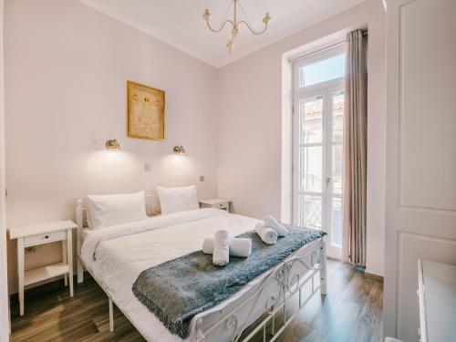 Deluxe Double Room with Balcony 1st Floor room in Neapolis 1897 Boutique Luxury Rooms