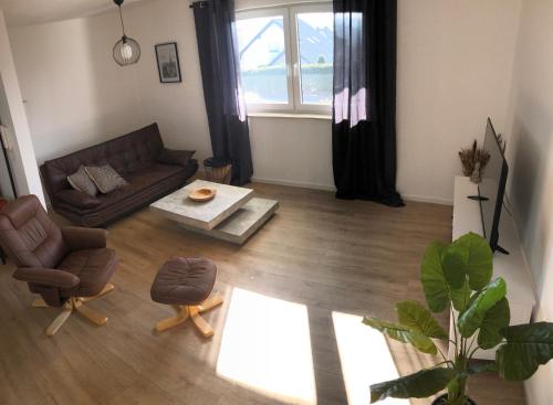 Modernes 2,5 Zimmer Apartment in Eppelborn, privater Eingang, eigener Parkplatz und Terrasse, Deine Ferienwohnung in Eppelborn mitten im Herzen des Saarlandes