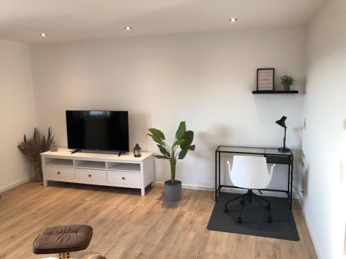 Modernes 2,5 Zimmer Apartment in Eppelborn, privater Eingang, eigener Parkplatz und Terrasse, Deine Ferienwohnung in Eppelborn mitten im Herzen des Saarlandes