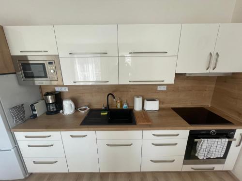 廚房, Apartmán HM (Apartman HM) in 賀爾尼馬爾索夫