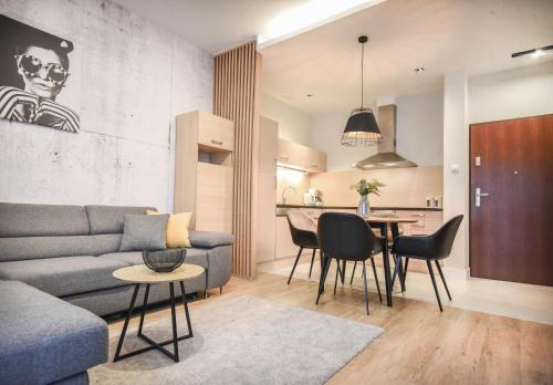Apartment with Partial Sea View and Free Parking Place room in Apartamenty Na Wyspie - Baltic Park - Apartamenty z sypialnią i parkingiem - ul Uzdrowiskowa 24-34
