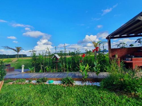 Chalé Sol com hidromassagem em meio a natureza