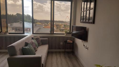 ห้องส่วนกลางสำหรับนั่งเล่น/ดูทีวี, Maia Apartment in ไมอา