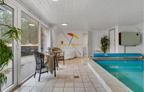 Swimming pool, Pet Friendly Home In Blavand With Sauna in Vejers Strand