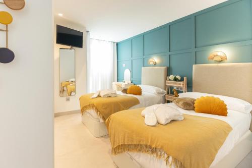 Apartamentos Martalia Nerja - Tap to explore photos