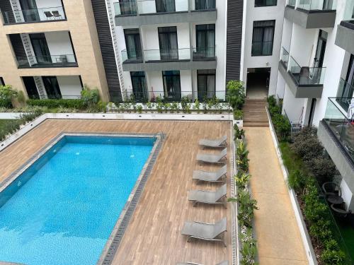 King Size Bed & 129 Mb Data Speed 1BR en suite with pool at Embassy Gardens, Cantonment, Accra, Accra (foto 7)