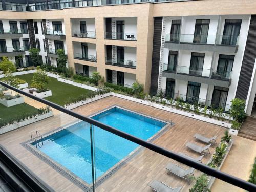 King Size Bed & 129 Mb Data Speed 1BR en suite with pool at Embassy Gardens, Cantonment, Accra, Accra (foto 6)