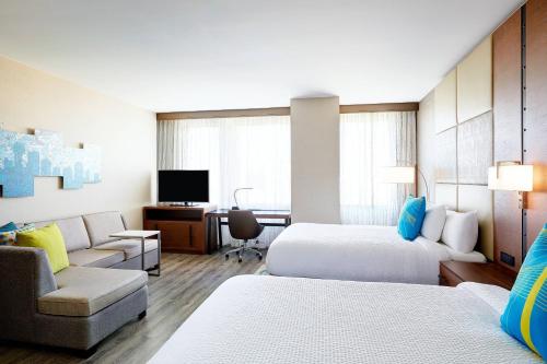 Queen Studio with Two Queen Beds and Sofa Bed image 2