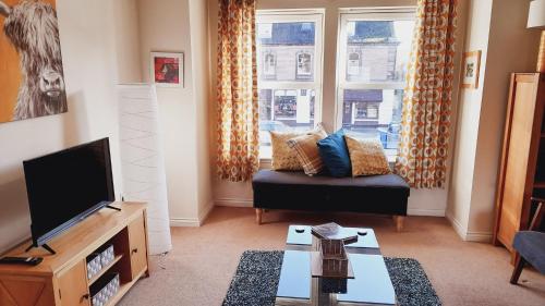 Beauly Holiday Home - Tap to explore photos