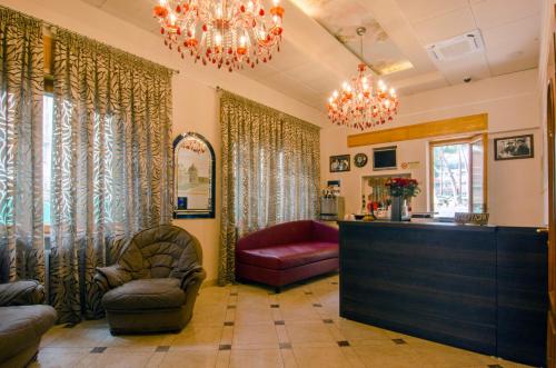 Фойє, Hotel Maria in Піза