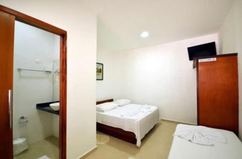 Triple Room room in Pousada do Itaguá