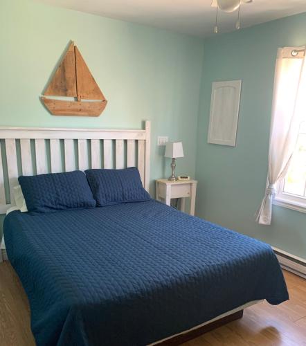 Whispering Waves Cottages - Tap to explore photos