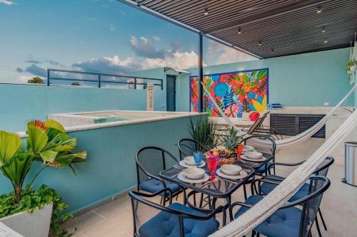 Rincón del Cielo Rooftop with glass walled pool in Mérida, Mexico