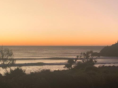 So close to the surf and headland with a pool!