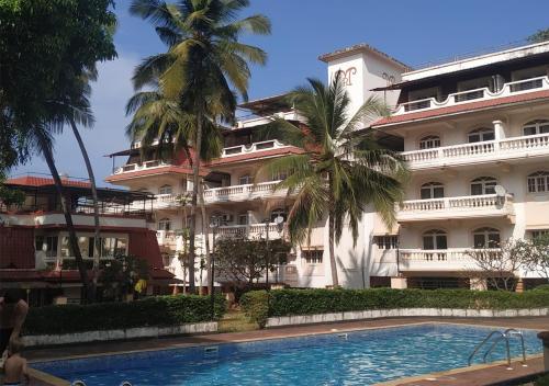 'Experience Blissful Living' Your Perfect 1BHK Retreat with AC, Wi-Fi, Gym & Pool, Only 5 Minutes from the Beach