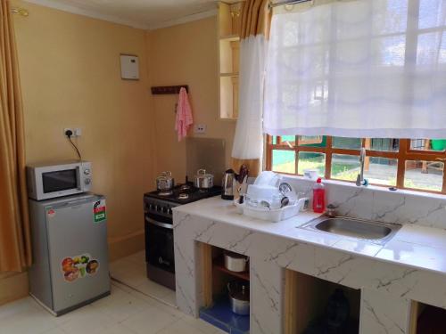 Wooden Knee Cottages Nanyuki in Nanyuki