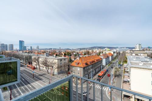 One-Bedroom Apartment with Balcony and City View