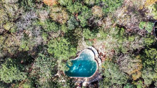 Swimming pool, Hotel Boutique Cenote Secreto Maya in Chichen Itza