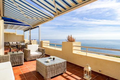 Seaview terrace by the beach in El Faro Ref 93