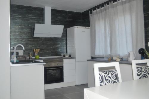 Kitchen, Suena TOLEDO- Piscina in Vistahermosa