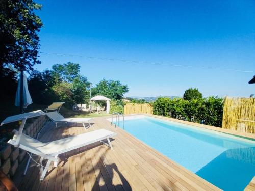 One bedroom house with sea view shared pool and enclosed garden at Montelabbate