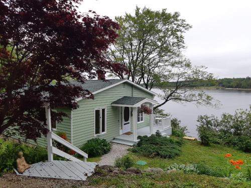 Oceanfront Garden Cottage - private cove beach