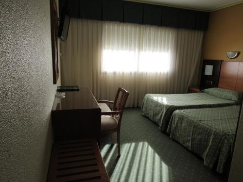 Hotel Virgen del Camino Pontevedra Set in a prime location of Pontevedra, Hotel Virgen del Camino Pontevedra puts everything the city has to offer just outside your doorstep. The hotel offers a wide range of amenities and perks to ensu