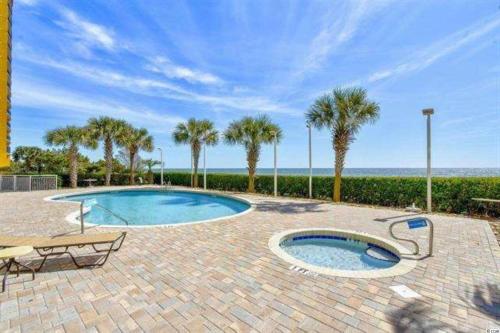 Breathtaking 2BR Condo w Floor-to-Ceiling Windows Overlooking Ocean - image 8