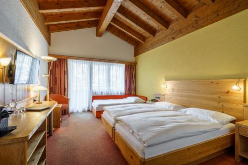 Triple room, ground floor, balcony, terrace, 3 beds
