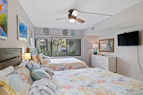 Coastal Oasis with Pool Access and Walk to Beach! - main image