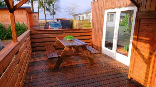 *Little Oak* Een knusse houten chalet met veranda in een bosrijke omgeving