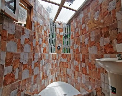 Bagno, Hostal Doña Clarita Inn (Hostal Dona Clarita Inn) in Chugchilán