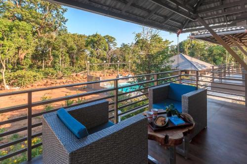 Coffee & Mist Luxury Villa- Comp Breakfast, Pool, Lounge, and Coffee Estate by StayVista