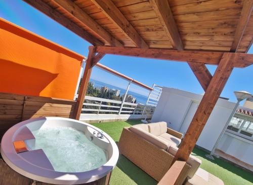 Penthouse with private pool, hot tub jacuzzi with sea views and chill-out zone, close to the sea