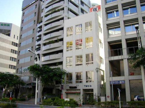 a large building with many windows in a city, Inn Grace Naha in Okinawa Main island
