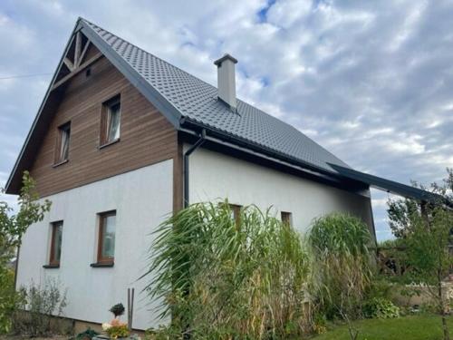 Domek Na Wsi - sauna i kominek in Радзимін