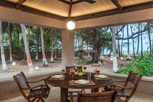 SaffronStays Bay Watch, Palghar - beachfront pool villa at Kelwa Beach