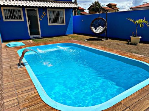 Casa Luxo com Piscina e área gourmet à 2 minutos da praia com Wifi em Unamar Cabo Frio RJ