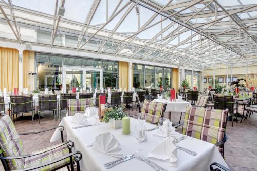 Restaurant, ABACUS Tierpark Hotel in Lichtenberg