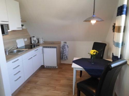 Kitchen, Appartementhaus Diana in Gromitz